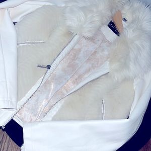 Excellent condition, worn once, no snags, all  intact white with cream fauxfur